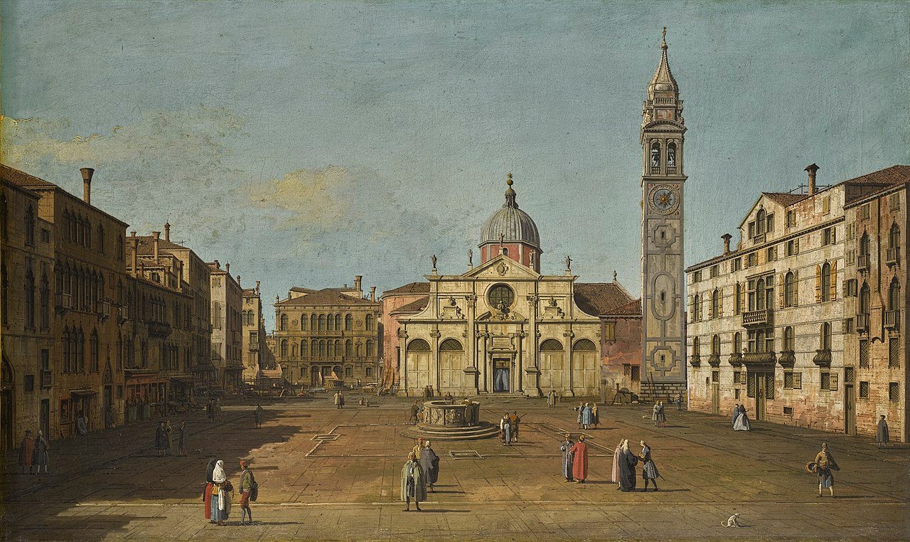A sunlit Italian square with people walking, a domed church with a tall bell tower in the background, surrounding buildings, and a fountain at the centre of the plaza.