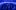 A large group of people sits on benches in a dark, immersive room lit with blue light and wave patterns. White text on the wall reads HIT ME HARD AND SOFT and SKINNY.